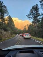 Officials hope cooler weather will help tame raging fire